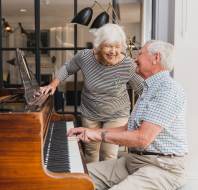 Owners playing the piano at a retirement village