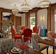 Wood panelled restaurant with large windows