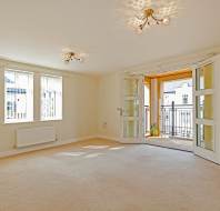 Living room with open balcony doors