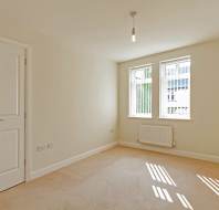 Bedroom with white walls