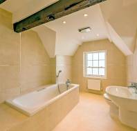 Modern bathroom with timber roof-beams