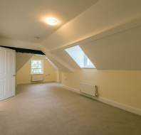 Long, spacious attic room