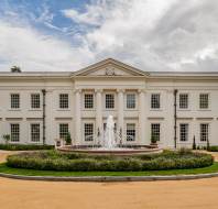 Mansion house with broad drive and fountain