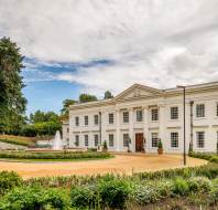 Country mansion house with fountain