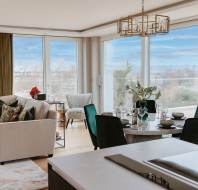 Looking over dining table to view of Clapham Common