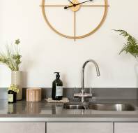 Kitchen sink with feature clock