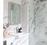 Wet-room shower with marble-effect tiles