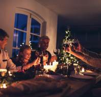 Family generations around the table at Christmas time