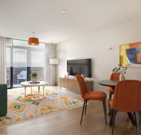 A modern living and dining area features a green sofa, orange chairs, a patterned rug, a TV on a wooden stand, and large windows with sheer curtains.