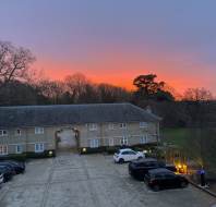 Golden hour at Audley Mote House, as captured by team member Bibiana Taylor