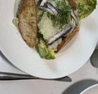 Summer menu - Caesar Salad with garlic croutons, pancetta, anchovies and a soft boiled egg (GF*)