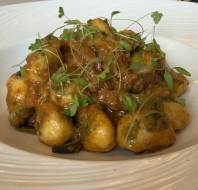 Summer menu - Potato gnocchi with sauteed courgette, tomato and basil sauce, and grated parmesan (N, V*)