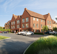 CGI of retirement properties in red brick with cross-gable roofs