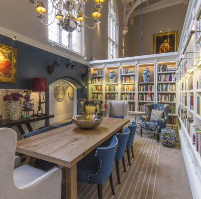 Bookshelves and grand Victorian furnishings