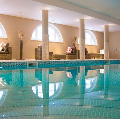 Indoor pool with soft lighting