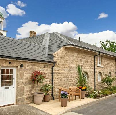 Converted stables in pale stone