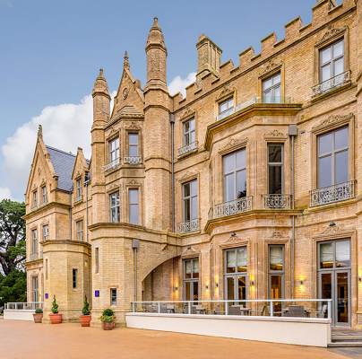 Pale stone building in Victorian-Gothic style