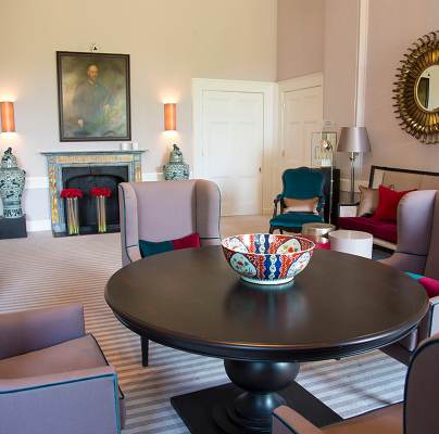 Soft chairs in Georgian lounge