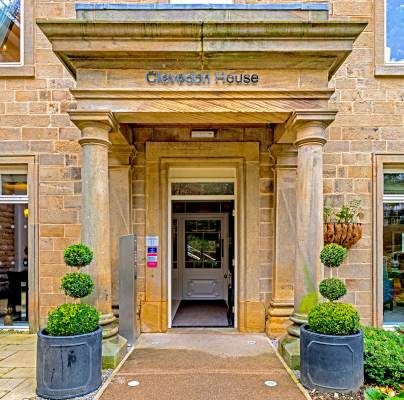 Covered entrance with stone pillars