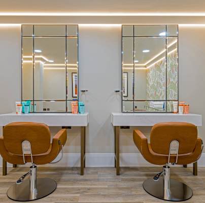 Hair salon, view on the armchairs and mirrors