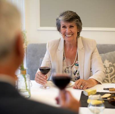 Man and woman enjoying wine with dinner