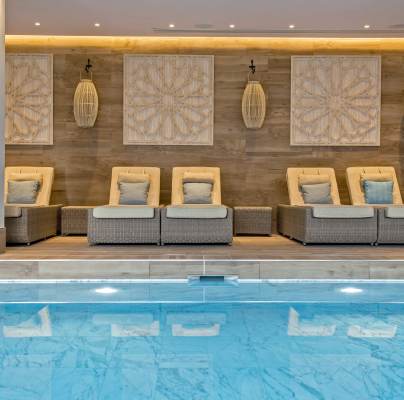 Recliners by indoor pool
