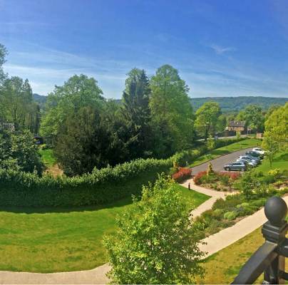 View over garden from an apartment balcony