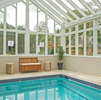 Swimming pool in glazed building