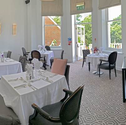 Restaurant tables set for lunch