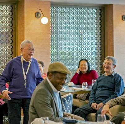 London downsizing event showing people sharing a laugh