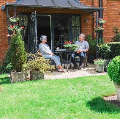 Owners in their retirement village garden