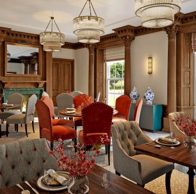 Wood panelled restaurant with large windows