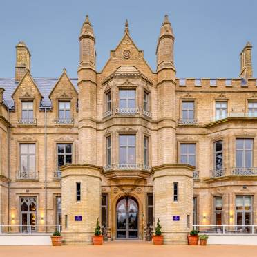 Victorian gothic entrance with towers and turrets