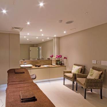 Massage bed in a treatment room