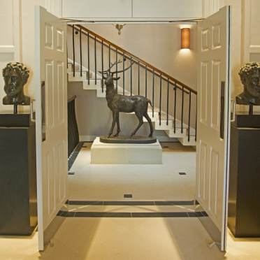 Stag sculpture and staircase