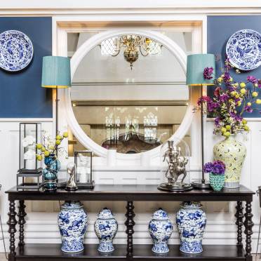 Ornate dressing table and large porthole window