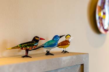 Colourful glass bird decorations 