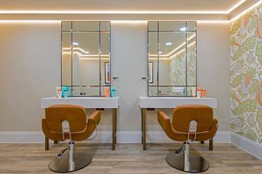 Hair salon, view on the armchairs and mirrors