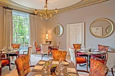 Restaurant Restaurant with picture windows and tables set