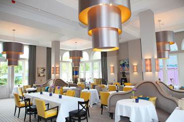 The Orangery restaurant at St Elphin's Park Cream and mustard interior of a restaurant