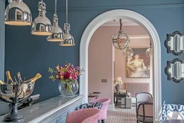 Bistro and bar with stone blue and blush pink interior