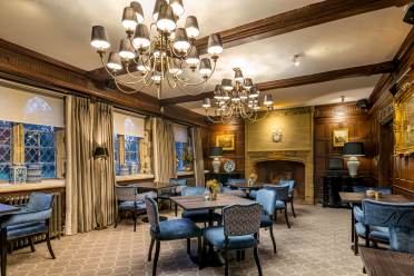 The Montfort restaurant, Audley Stanbridge Earls Restaurant with large stone fireplace