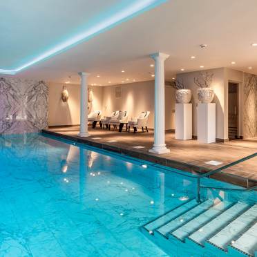 Swimming pool and soft lights on the relaxation area