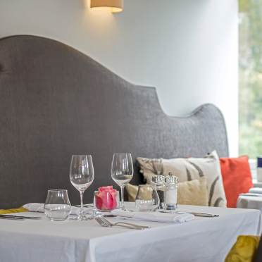 Restaurant table with banquette seating