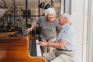 Owners playing the piano at a retirement village