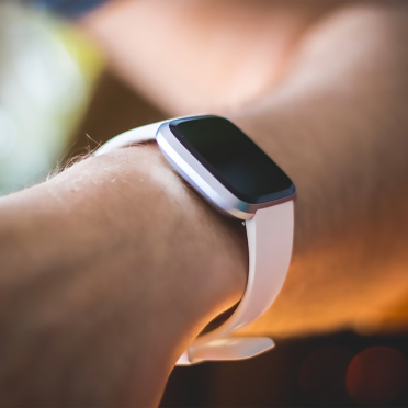 Wrist with a smartwatch as fitness tracker