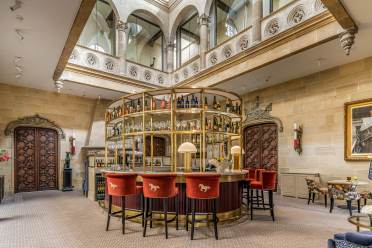 Island bar under grand stairwell