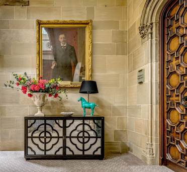 Framed portrait and side table