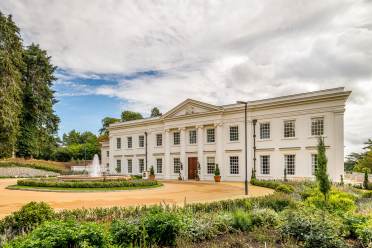 Country mansion house with fountain