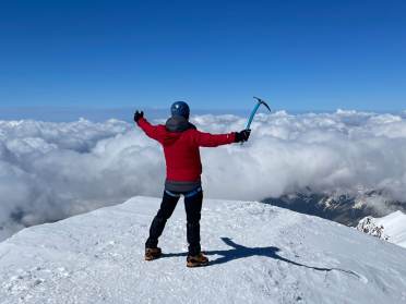 Voitek reaches the summit on a previous climb